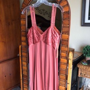 Rust and orange type of color to shorter dress.